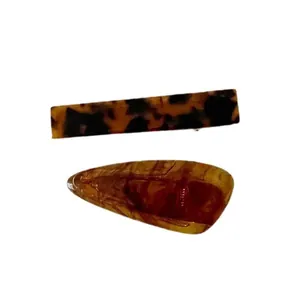 Acetate hair clip set with marble leopard print and amber resin duckbill clips