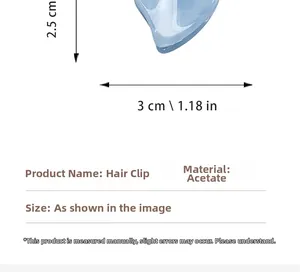 Mini pince à cheveux en acétate bleu avec dimensions précises de 3cm par 2,5cm