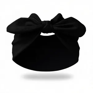 Detailed texture of black knotted rabbit ear headband made of soft elastic fabric