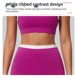 Détail du short de yoga taille haute avec contraste blanc côtelé et design double couche