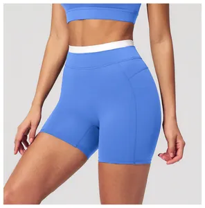 Détail du short de yoga bleu roi à taille haute avec ceinture élastique blanche sport