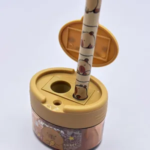 Close-up of cute cartoon capybara pencil sharpener with dual holes and matching pencil