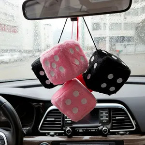 Pink and black plush fuzzy dice car hanging ornament with white dots on rear view mirror
