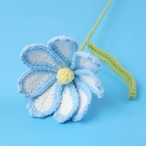 Handmade crochet flower bouquet in light blue and white colors for home decoration