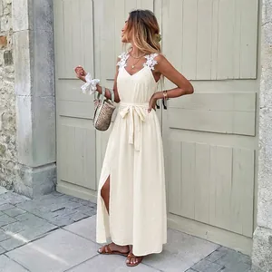 Elegant cream sleeveless maxi dress with floral lace straps and side slit detail
