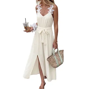 Sleeveless cream maxi dress with floral lace straps and high side slit detail