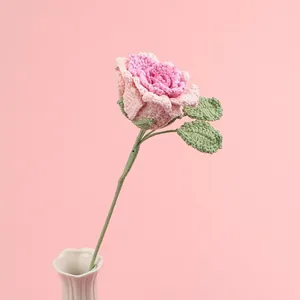 Handmade crochet rose with pink gradient petals and green leaves for home decor