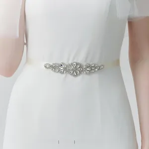 Detailed view of luxury bridal sash with sparkling crystal floral rhinestones