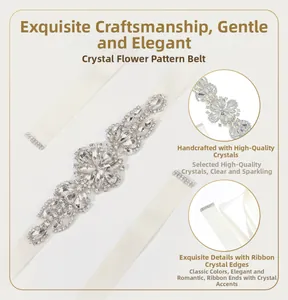 Detail view of rhinestone floral bridal belt with high-density crystals on white ribbon