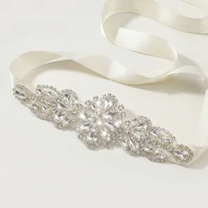 Luxury bridal belt with sparkling crystals on ivory satin ribbon for wedding dresses