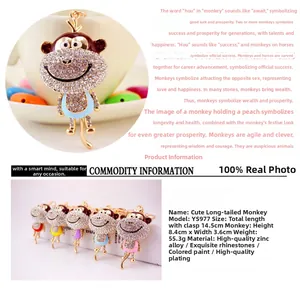 Detailed view of rhinestone monkey keychain with dimensions and colorful metal plating