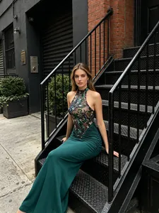 Elegant halter neck bodycon maxi dress with sequin floral embroidery and pleats
