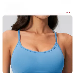 Detailed close-up of sky blue sports bra with U-neck and dual thin shoulder straps