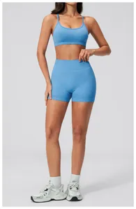 Close-up of seamless light blue yoga set featuring a U-neck bra and high-waist shorts