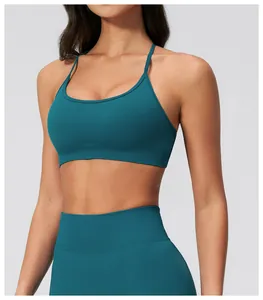 Close-up of seamless dark green ribbed knit texture on high-waist yoga sports bra