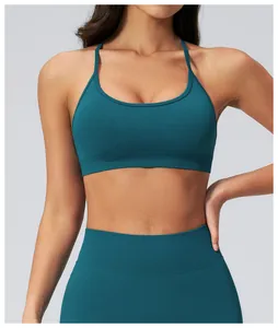 Detail of teal seamless ribbed yoga sports bra and high-waisted leggings set