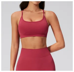 Detail of burgundy seamless yoga set with ribbed support band and high-elastic fabric