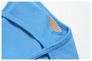 Detail of blue seamless yoga bra showing honeycomb texture and removable padding