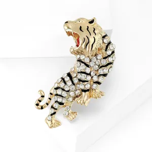 Detailed view of roaring tiger brooch with crystal rhinestones and black enamel stripes