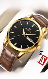 Nahaufnahme der goldenen Edelstahllünette und des braunen Lederarmbands mit Datum
