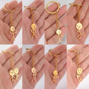 Funny doodle stickman keychain collection in gold finish featuring various quirky poses