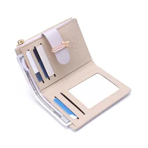 Women's compact PU leather bifold wallet with bow buckle and multiple card slots