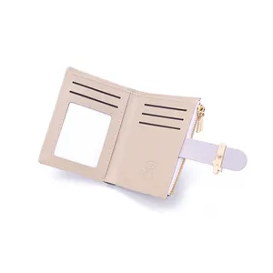 Detail view of foldable PU leather wallet with card slots, ID window, and zipper pocket