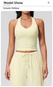 Detail view of creamy yellow brushed yoga vest with halter neck and slim fit design