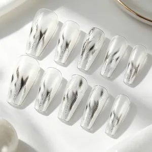 Silver flame cat eye coffin nails with glossy finish and translucent marble effect