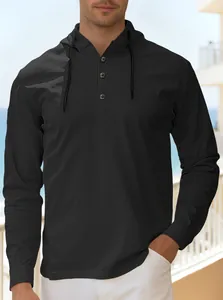 Detail showing the three-button placket and adjustable drawstring of a men's black hoodie
