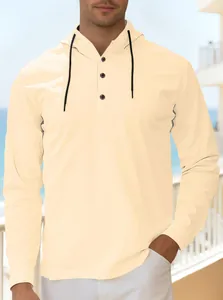 Detail of men's beige polo hoodie featuring a three-button placket and black drawstrings