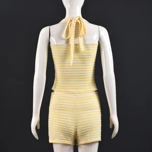 Back view of yellow and white striped halter top and slim shorts knit set