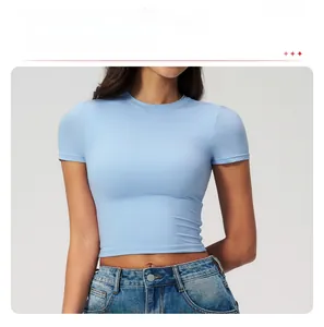 Detail of slim fit light blue quick-dry athletic t-shirt with crew neck design
