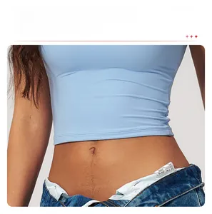 Close-up of light blue slim fit athletic shirt showing elastic fabric and waist fit