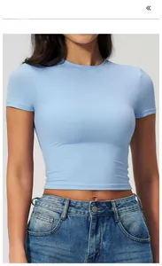 Close-up of tight-fitting light blue yoga t-shirt with high elasticity and fine stitching