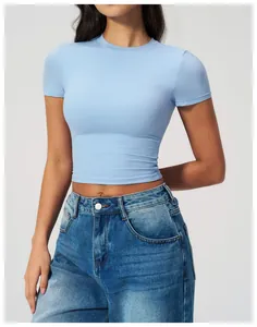 Slim fit light blue quick-dry athletic t-shirt paired with classic blue denim jeans