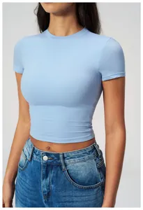 Close-up of slim-fit light blue athletic t-shirt with crew neck and elastic texture