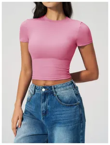 Slim fit pink yoga T-shirt with crew neck and moisture-wicking fabric for sports