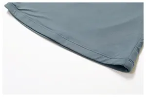 Close-up of double-stitched hem on dusty blue quick-dry athletic yoga shirt