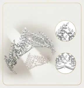 Close-up of baroque rhinestone bridal tiara with alloy leaf design and silver finish