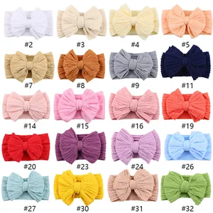 Elastic jacquard baby headbands with large bows in twenty different assorted colors