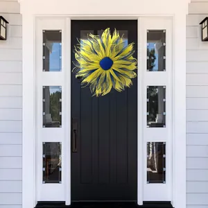 Ukraine prayer wreath featuring yellow and blue sunflower petals on a black front door