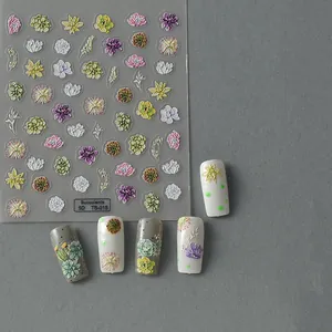Gros plan de stickers 5D en relief pour ongles avec fleurs et plantes succulentes réalistes