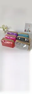 Sechs bunte wasserfeste PVC Kosmetiktaschen mit Glitzereffekt und Reißverschluss