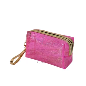 Rosa Glitzer-Kosmetiktasche aus PVC mit goldenem Reißverschluss und Handschlaufe