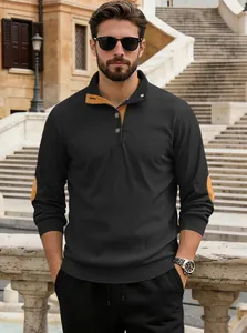 Detail of men's Henley neck knit shirt with brown suede elbow patches and ribbed cuffs
