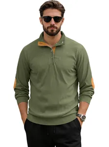 Detail of olive green corduroy polo with contrast elbow patches and ribbed cuffs