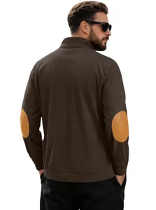 Detail view of corduroy sweatshirt with contrast oval elbow patches on the sleeves