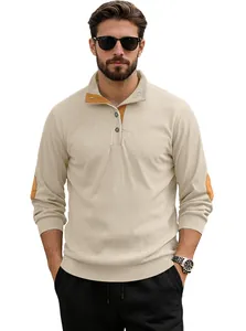 Close-up of cream knit Henley shirt with brown elbow patches and corduroy detail