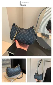 Detailed views of black crescent hobo bag with grey geometric pattern and gold chain